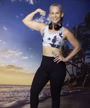 Silver Siren Kathy Wilson: Tattooed Fitness Guru from Dallas